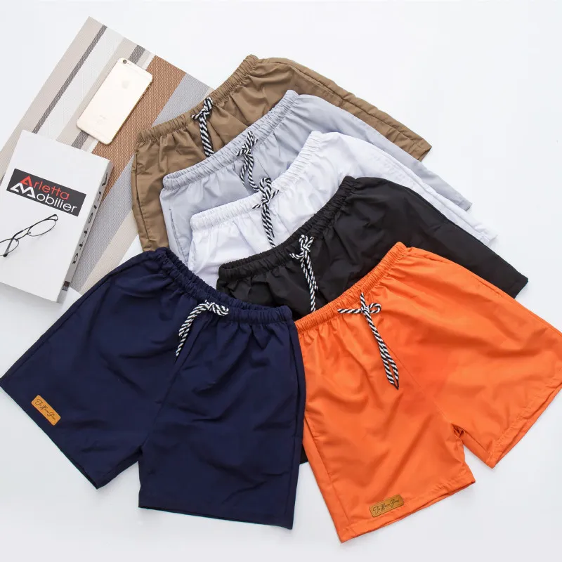 Men Casual Mid Waist Drawstring Solid Color Patch Shorts