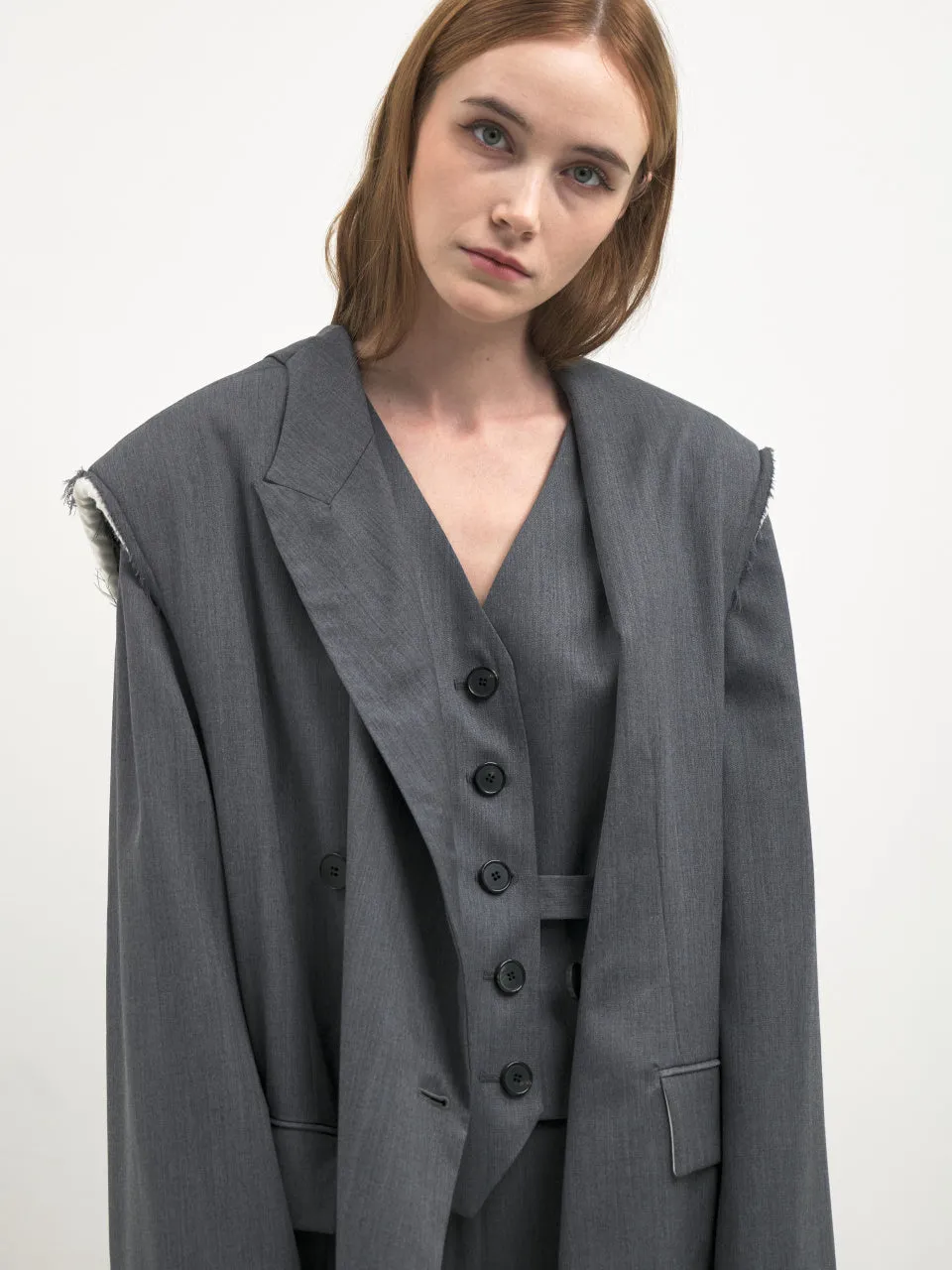 Signature off sleeve origami blazer